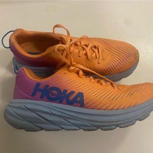 Gently used Hoka shoes. Very comfy just not my colors. Good condition.